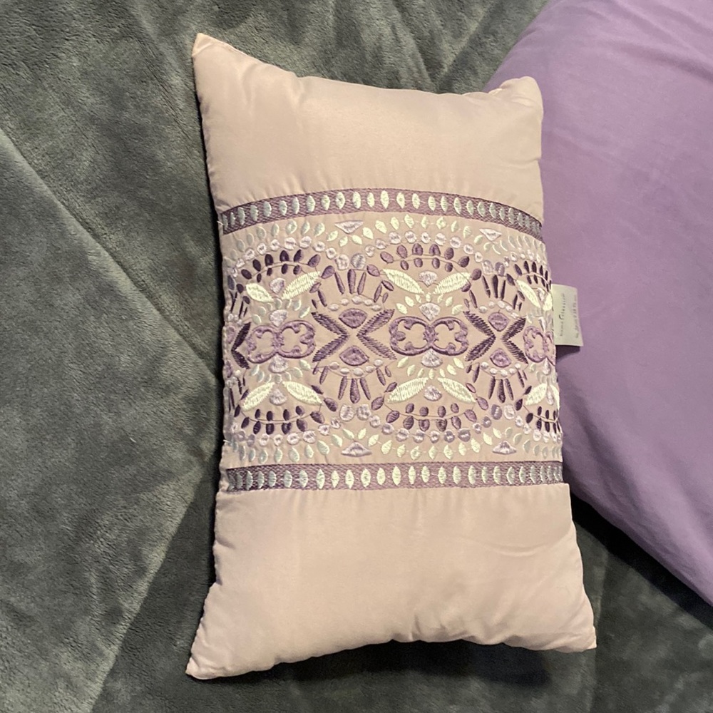 Small purple and lilac throw pillow